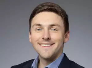 Headshot of Sam